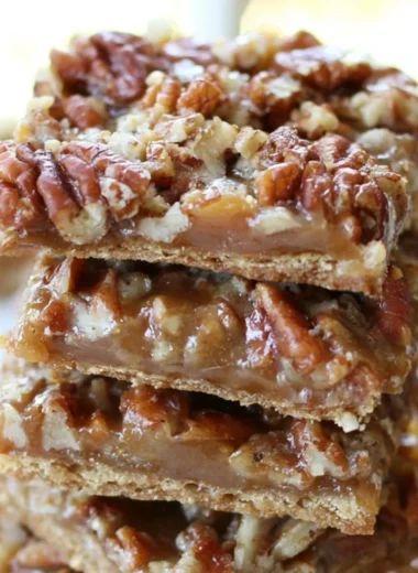 Cozy pecan pie bark with nuts and caramel on a wooden table