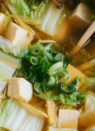 Bowl of delicious Napa Cabbage Tofu Soup with fresh cabbage and tofu