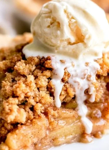 Deliciously baked Dutch Apple Pie with a flaky crust and spiced apple filling
