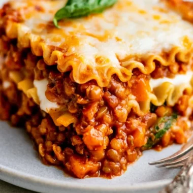 Delicious easy vegan lentil lasagna layered with fresh vegetables and sauce