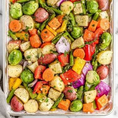 Colorful assortment of oven-roasted vegetables ready to serve.