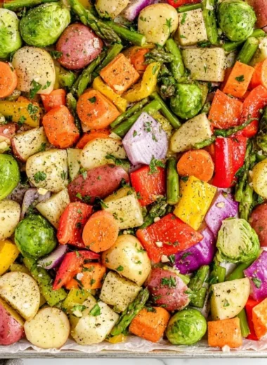 Colorful assortment of oven-roasted vegetables ready to serve.