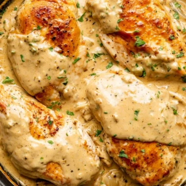 Creamy Boursin Chicken dish served with fresh herbs and vegetables
