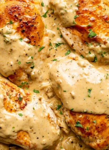 Creamy Boursin Chicken dish served with fresh herbs and vegetables
