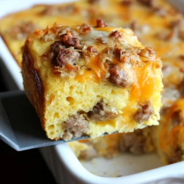 Delicious sausage cornbread casserole topped with herbs and spices