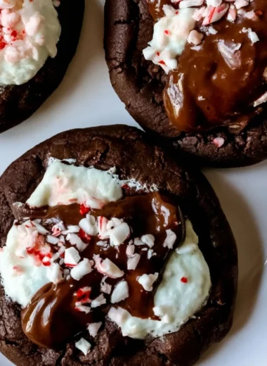 Plate of homemade hot cocoa cookies topped with marshmallows