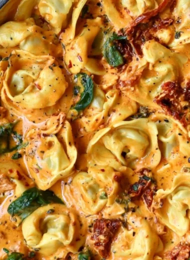 Delicious Marry Me Tortellini served with fresh herbs and tomatoes