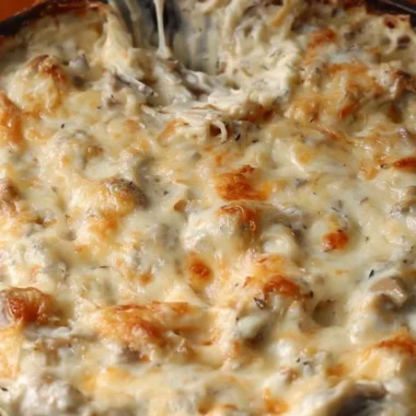 Delicious Stuffed Mushroom Dip served in a bowl with crackers
