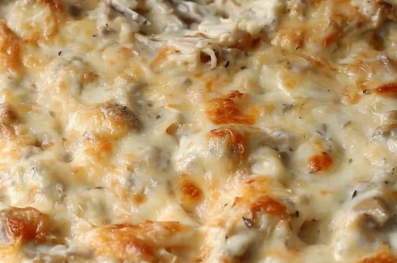 Delicious Stuffed Mushroom Dip served in a bowl with crackers